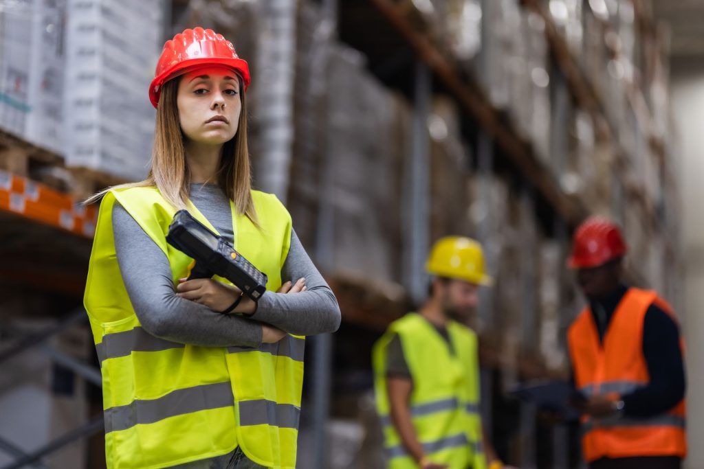 Warehouse worker with a handheld device